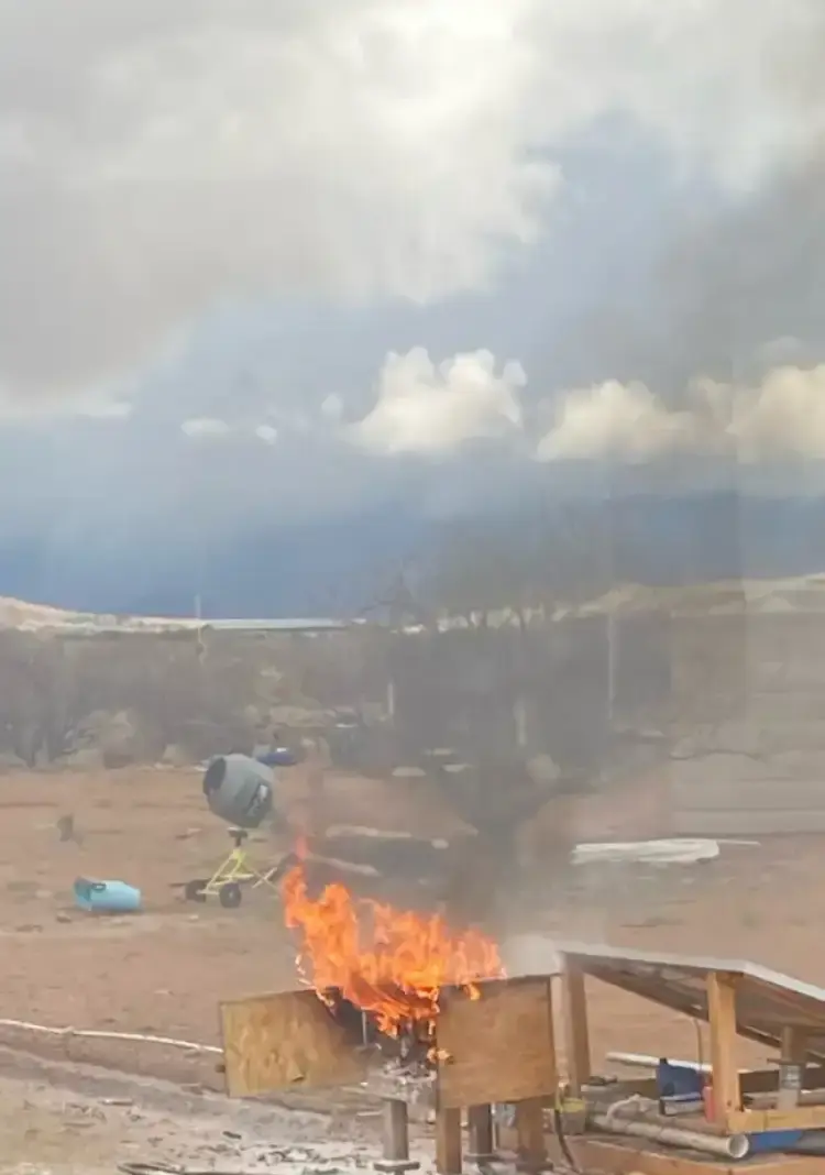 Smoke billowing up into the sky