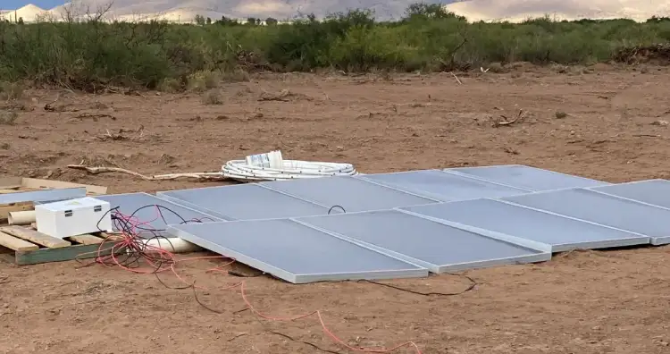 Solar panels laying on the ground
