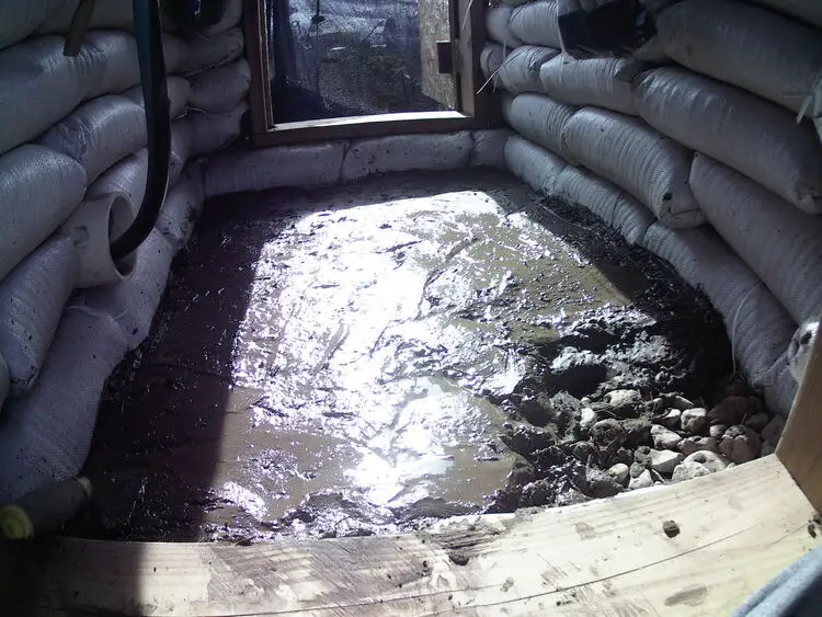 Plaster smoothed with rocks underneath