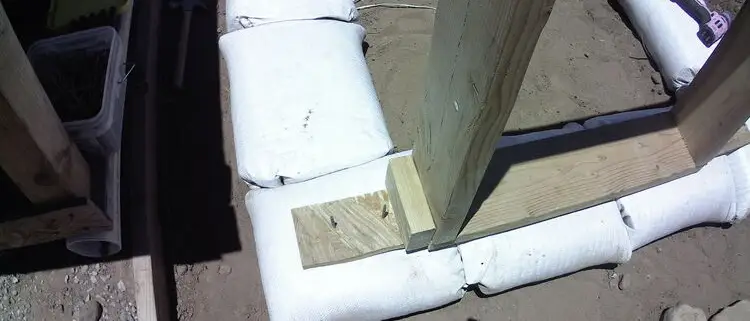 Wood door buck in place