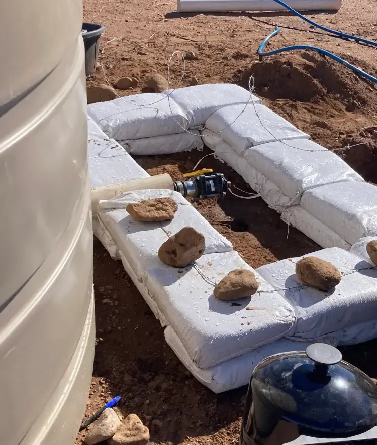 Barbed wire on sandbags